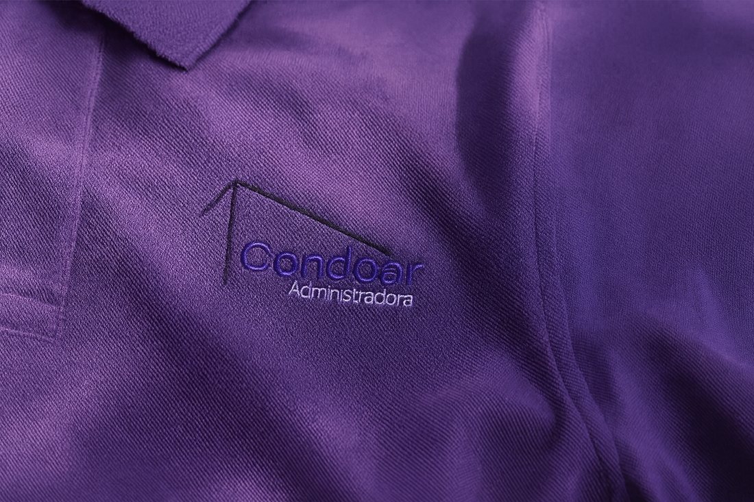 Uniforme da Condoar com o logo bordado